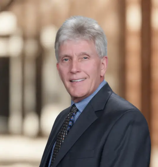 Ken Head Shot Gold Background